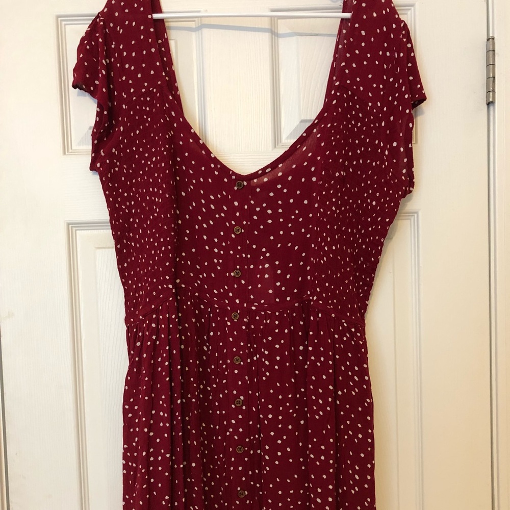 A red with white polka dots dress